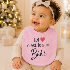 Bavoir "ici c'est le sud bébé" rose